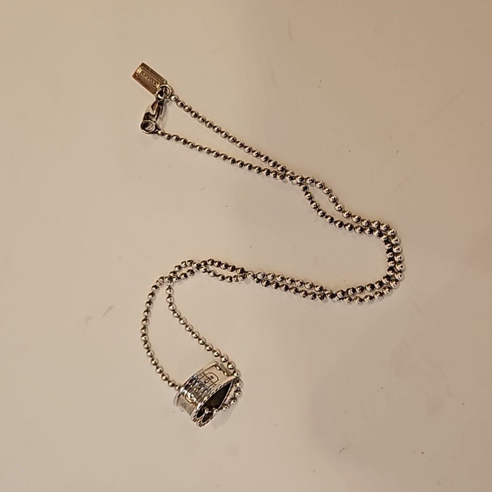 COACH OPEN HEART NECKLACE Silver in color Classic Fashion